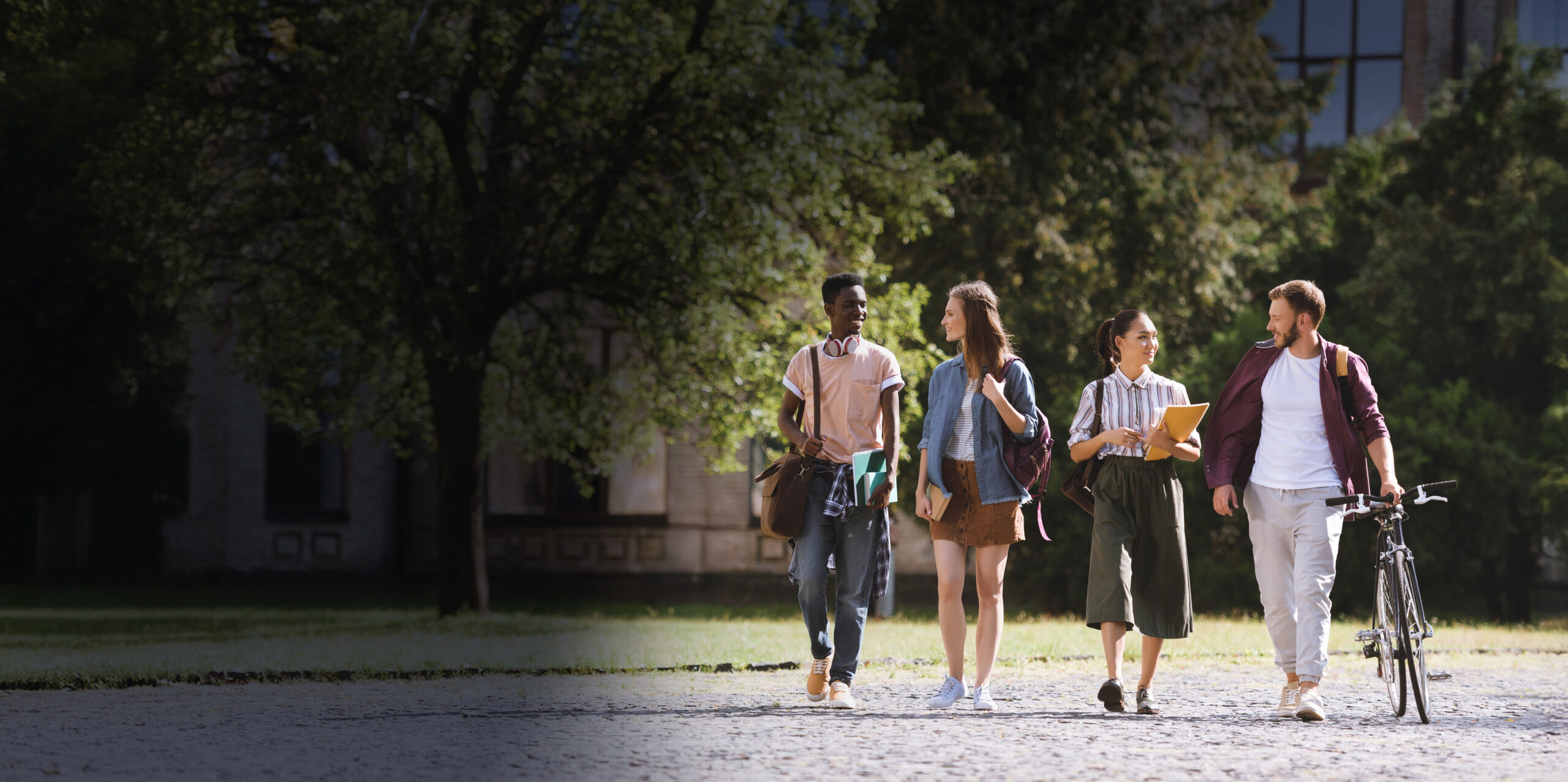 Image of college students walking on campus.
